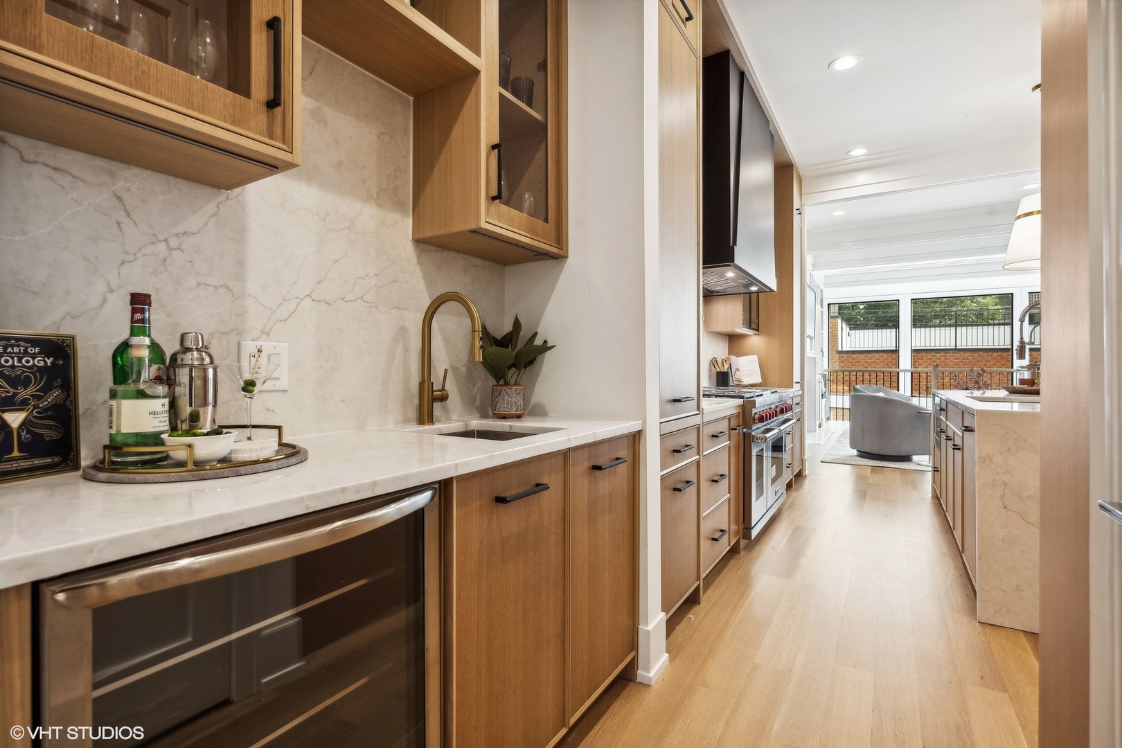 1413 North Mohawk Street Chicago, IL 60610 - Photo 5 of 51 a kitchen with counter top space a sink and appliances