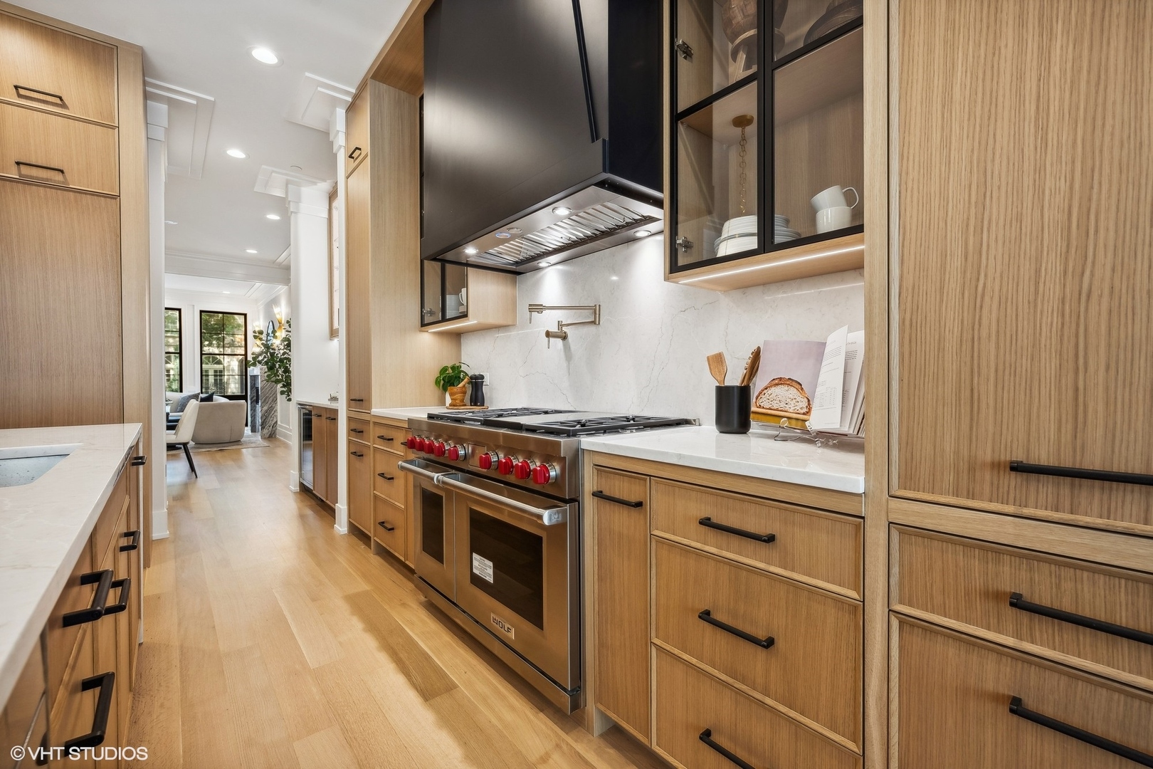 1413 North Mohawk Street Chicago, IL 60610 - Photo 8 of 51 a kitchen with stainless steel appliances granite countertop a stove and a sink