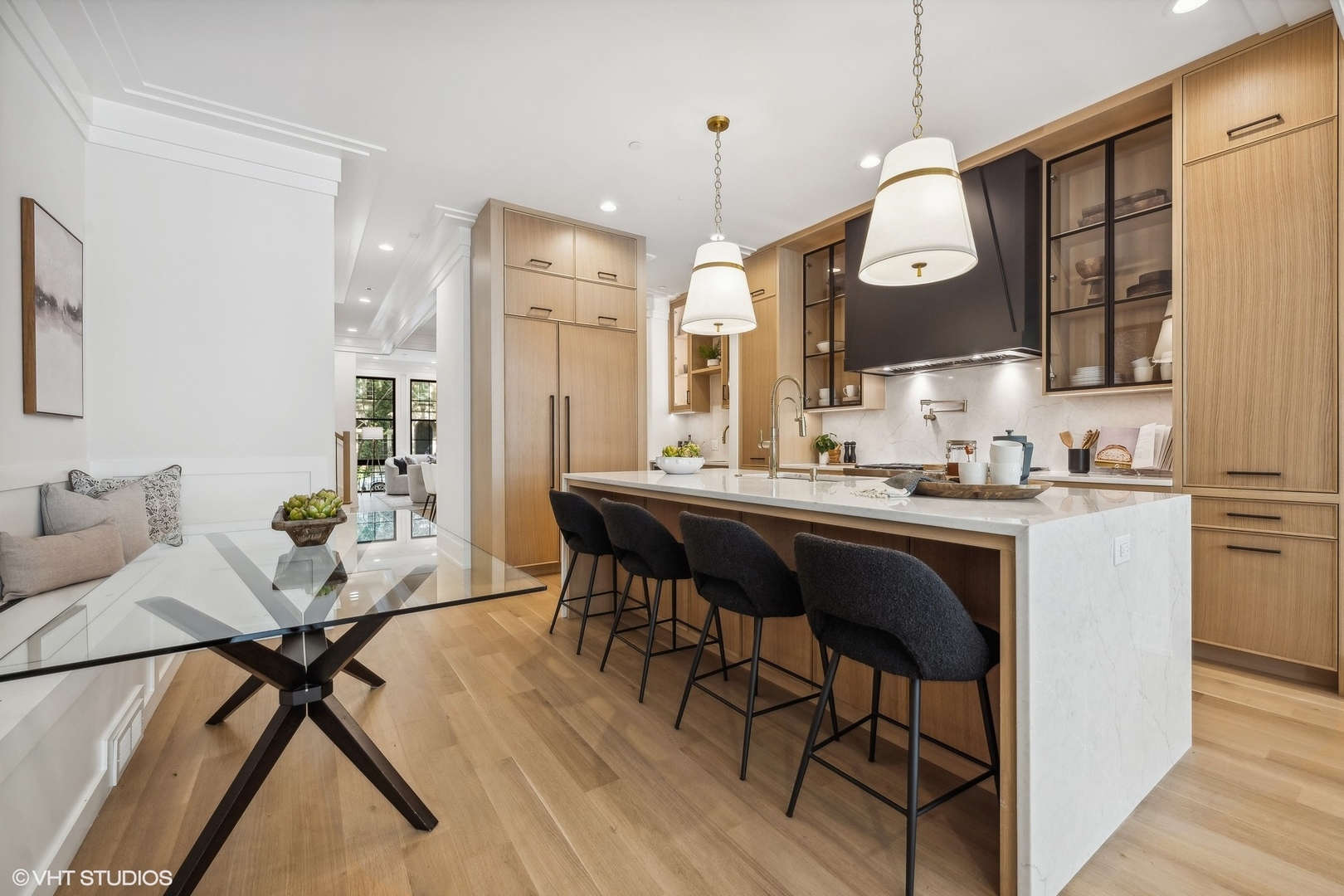 1413 North Mohawk Street Chicago, IL 60610 - Photo 10 of 51 a large kitchen with a table and chairs