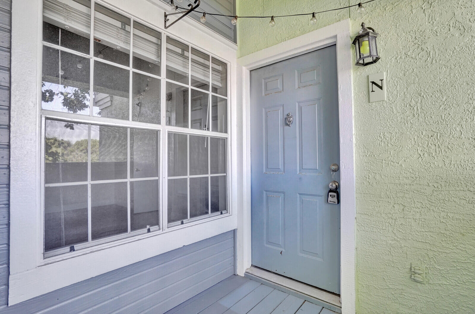 1215 Crystal Way, Unit N Delray Beach, FL 33444 - Photo 20 of 29 a view of wooden door
