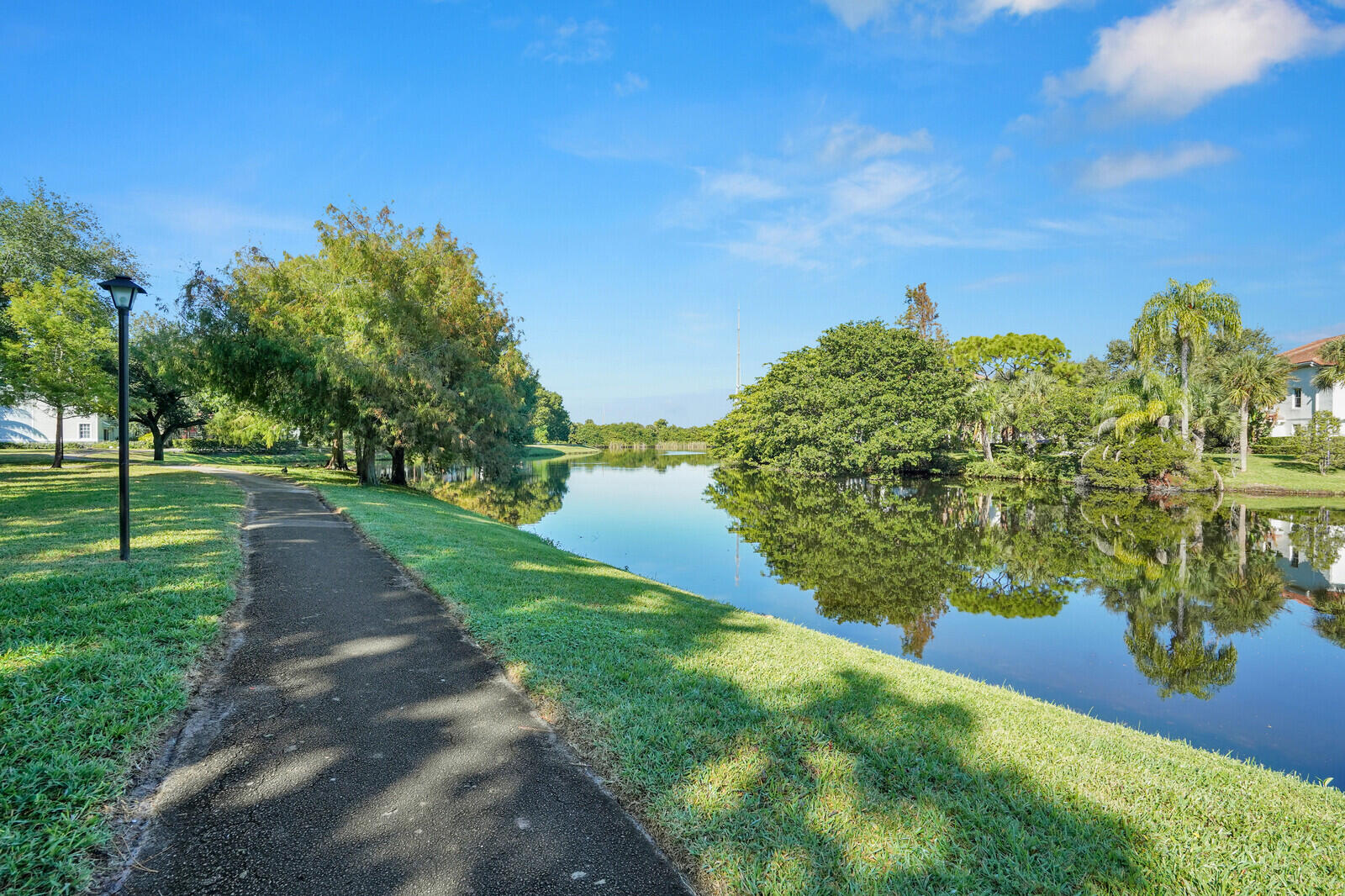 1215 Crystal Way, Unit N Delray Beach, FL 33444 - Photo 26 of 29 a view of a garden with an trees