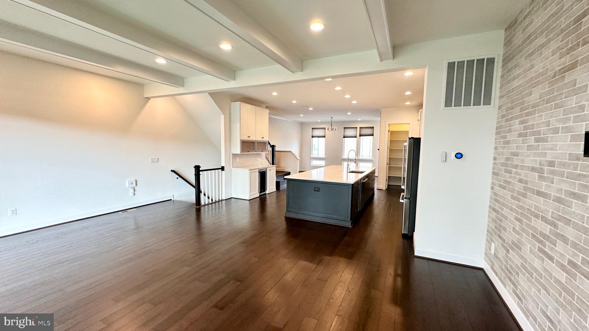 20265 Oak Bluff Drive Ashburn, VA 20147 - Photo 19 of 42 a view of a living room with furniture and wooden floor