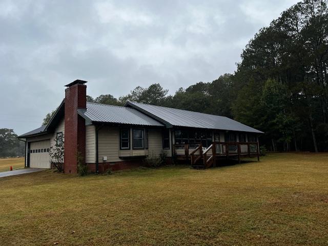 1966 Highway 142 Covington, GA 30014 - Photo 28 of 96 a view of a house with a yard and sitting area