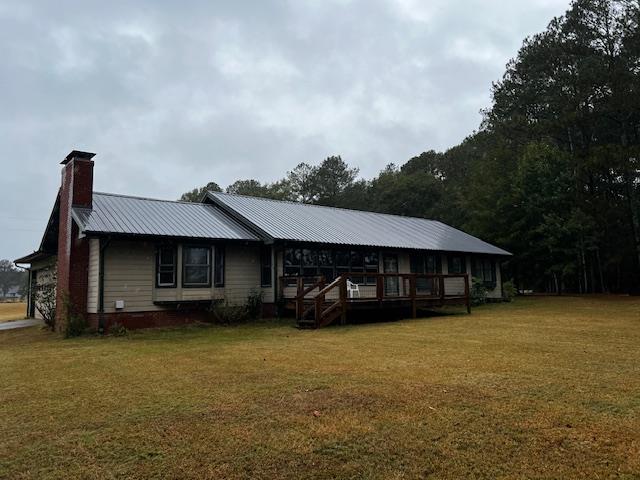 1966 Highway 142 Covington, GA 30014 - Photo 29 of 96 a view of a house with a yard and sitting area