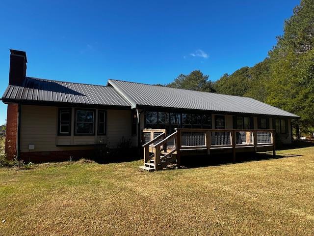 1966 Highway 142 Covington, GA 30014 - Photo 40 of 96 a view of a house with a yard and sitting area