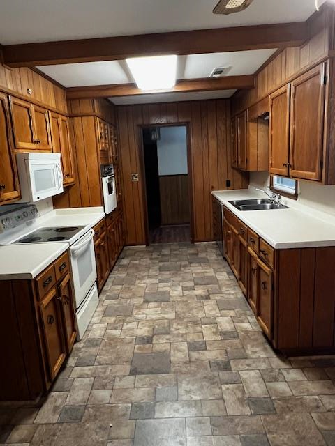 1966 Highway 142 Covington, GA 30014 - Photo 51 of 96 a kitchen with a stove top oven sink and cabinets