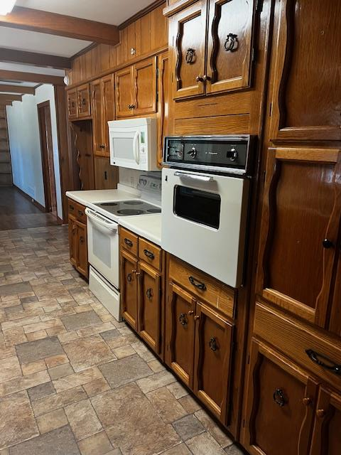 1966 Highway 142 Covington, GA 30014 - Photo 70 of 96 a kitchen with stainless steel appliances granite countertop a stove and a refrigerator