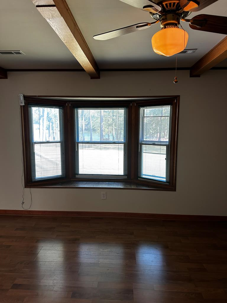 1966 Highway 142 Covington, GA 30014 - Photo 77 of 96 a view of a room with wooden floor and a window