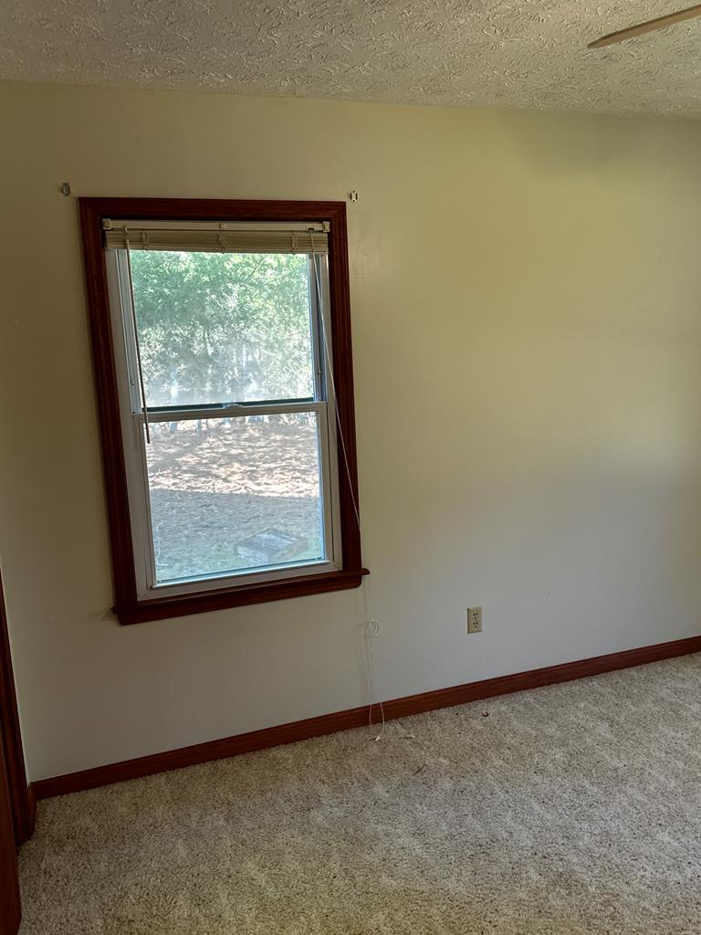 1966 Highway 142 Covington, GA 30014 - Photo 94 of 96 an empty room with a window