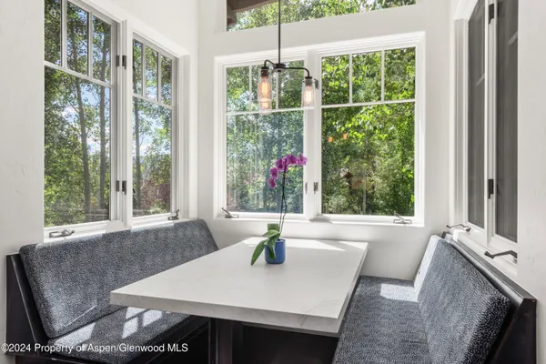 a bedroom with a bed and a fireplace