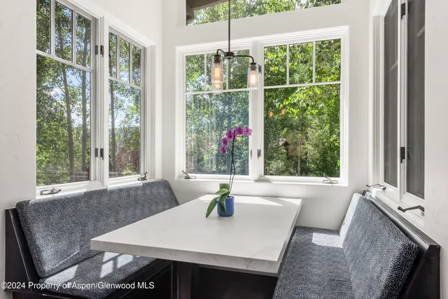 a bedroom with a bed and a fireplace