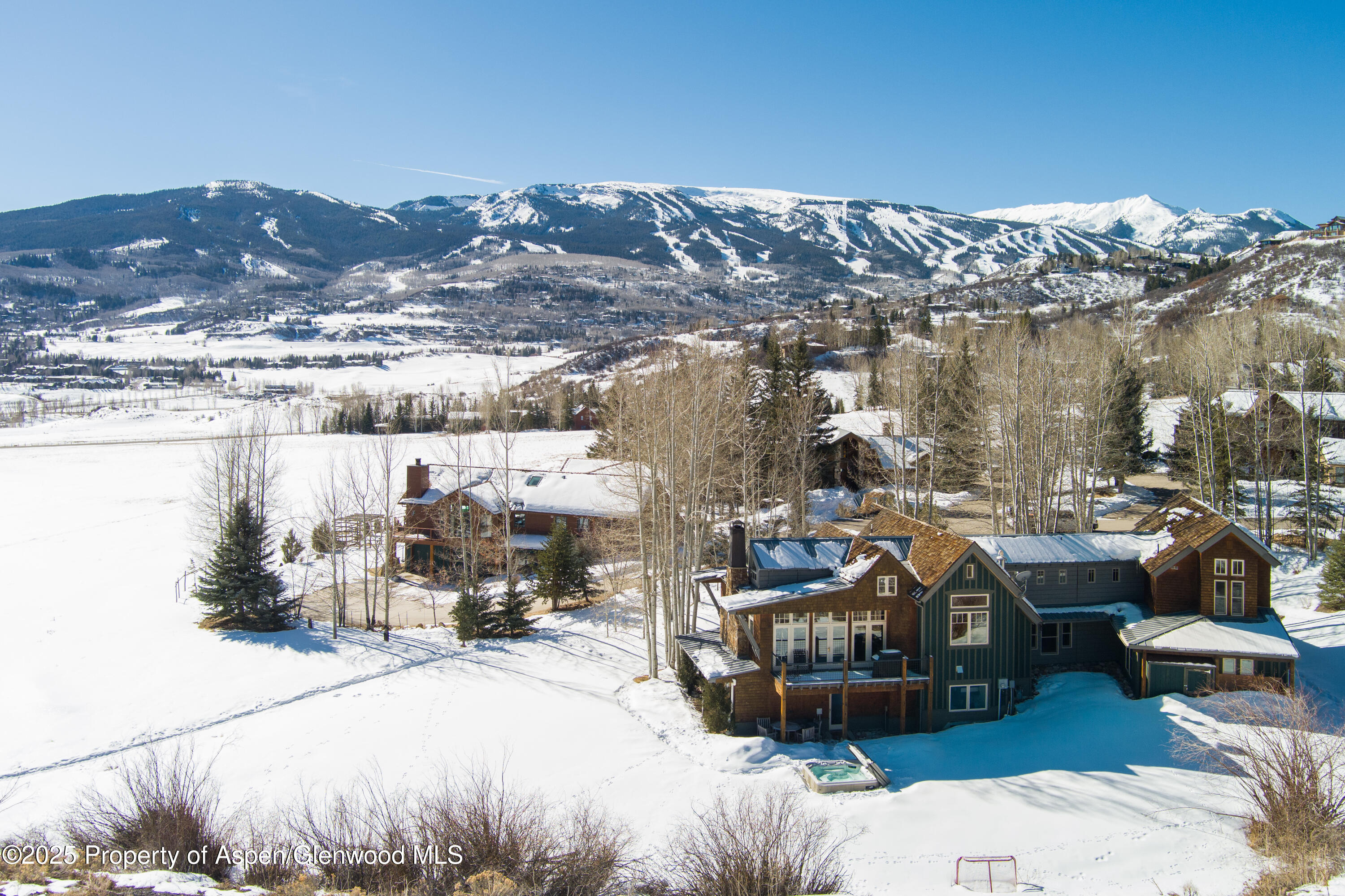 124 Trail Rider Lane Snowmass Village, CO 81615 - Photo 2 of 39 a view of a terrace with chairs