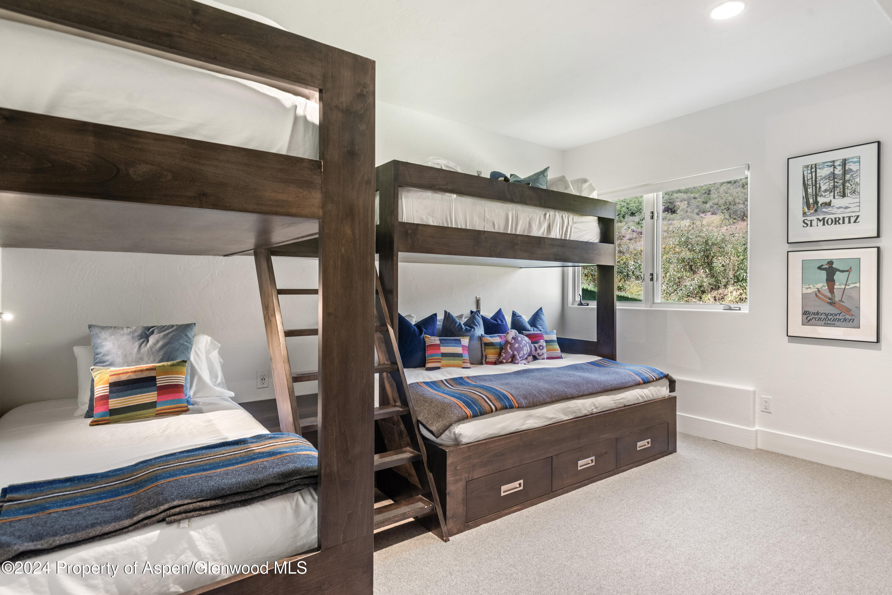 124 Trail Rider Lane Snowmass Village, CO 81615 - Photo 23 of 39 a bedroom with furniture and a window