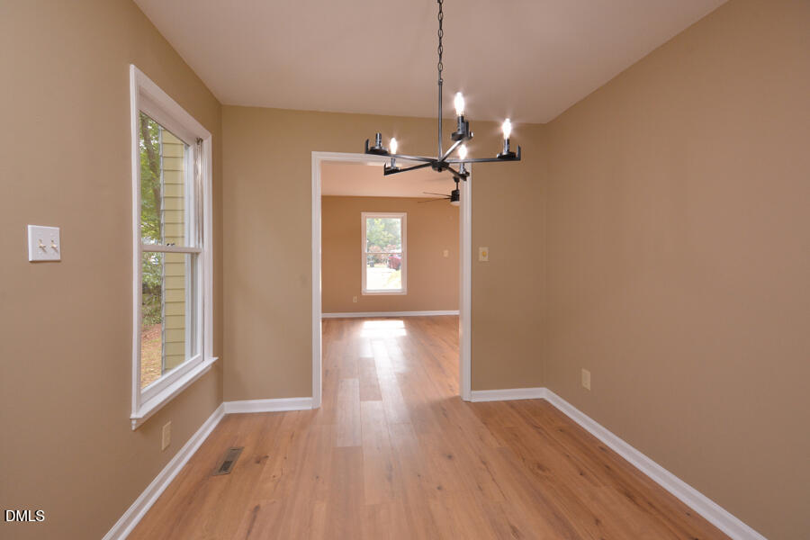 11 Tarawa Terrace, Unit B Durham, NC 27705 - Photo 15 of 32 a view of livingroom with hardwood floor and window