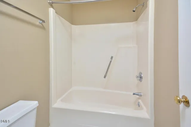 a close up of a bathtub in a bathroom