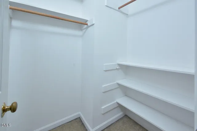 a view of small space with racks on the wall