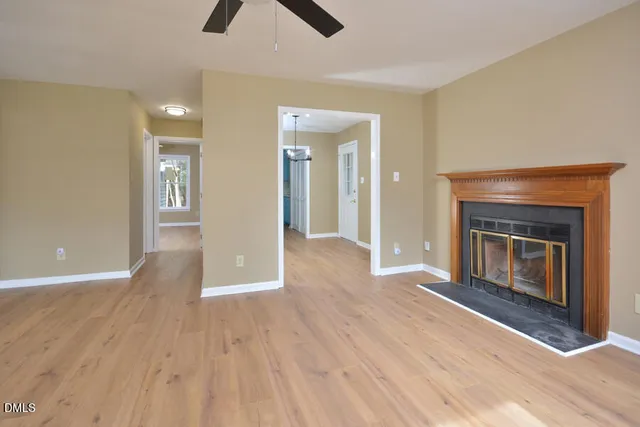 wooden floor fireplace and natural light