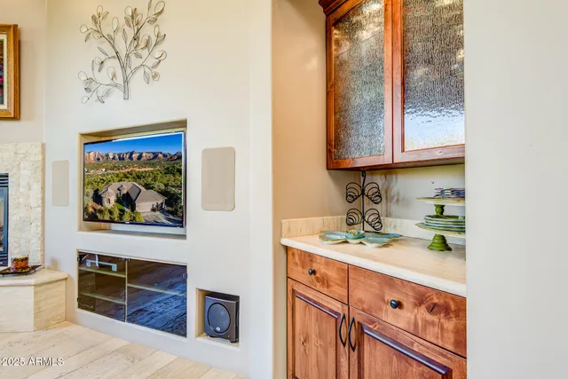 a view of walk in closet with clothes