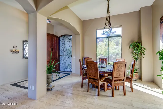 a spacious bathroom with a granite countertop tub and a large mirror
