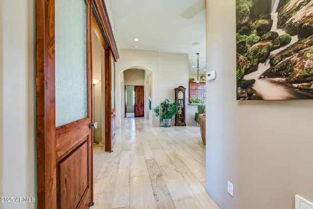 a bathroom with a tub and a window