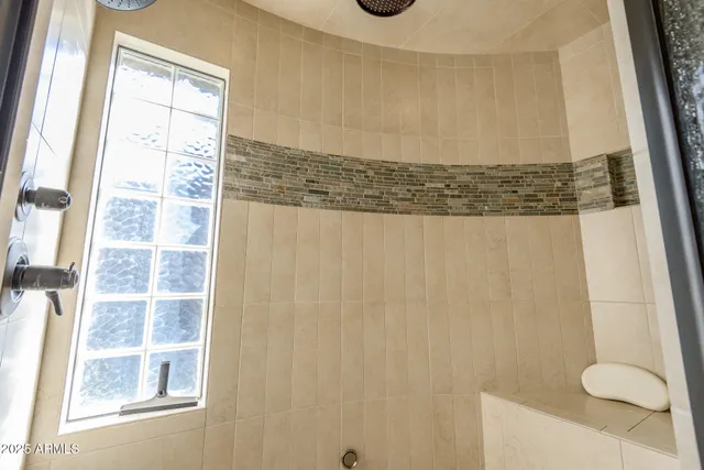 a view of swimming pool with outdoor seating