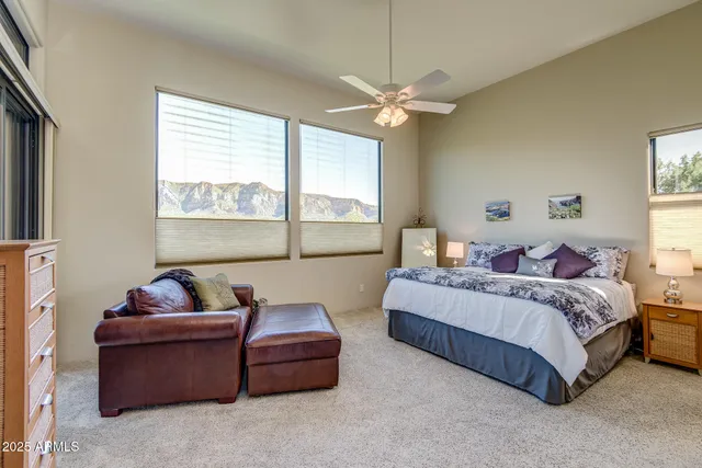 a view of a balcony with furniture