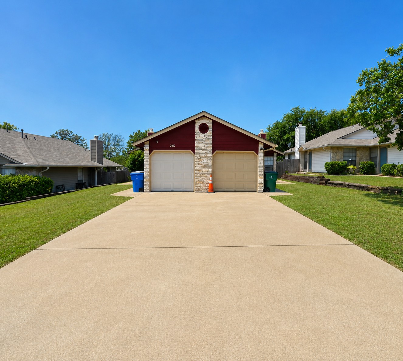 2013 Margalene Way Austin, TX 78728 - Photo 1 of 19 A well-maintained concrete driveway leads to the charming facade of this inviting residence.