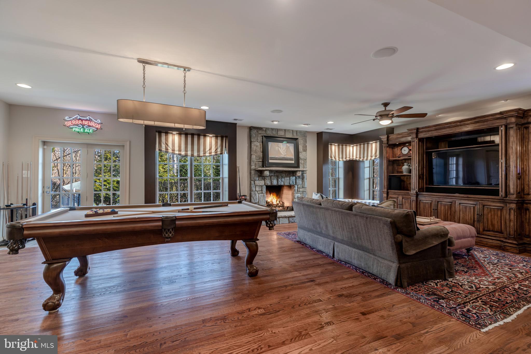 8429 Brook Road McLean, VA 22102 - Photo 33 of 48 Entertainment Center and Stone Fireplace