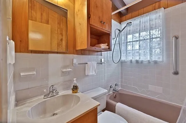 a bathroom with a sink and a bathtub
