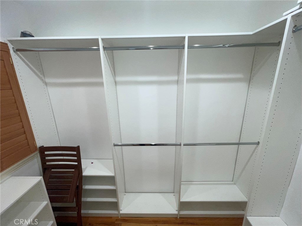 135 Canon Drive Beverly Hills, CA 90212 - Photo 28 of 42 a bathroom with a glass door shower