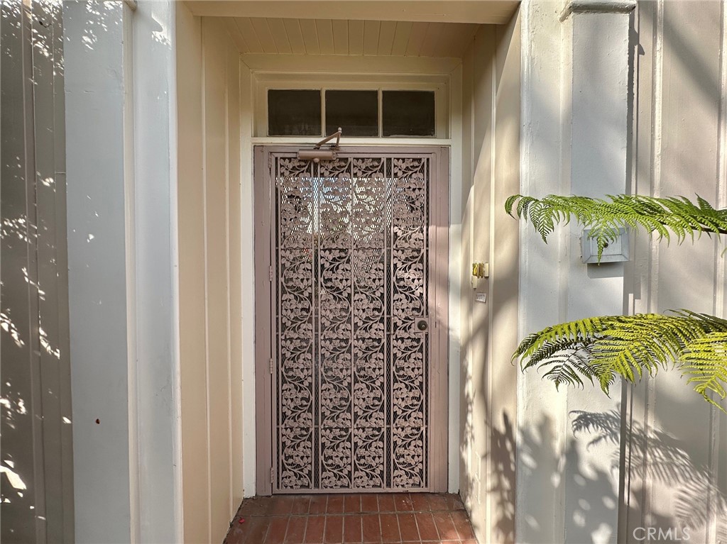 135 Canon Drive Beverly Hills, CA 90212 - Photo 4 of 42 a view of entryway with wooden floor