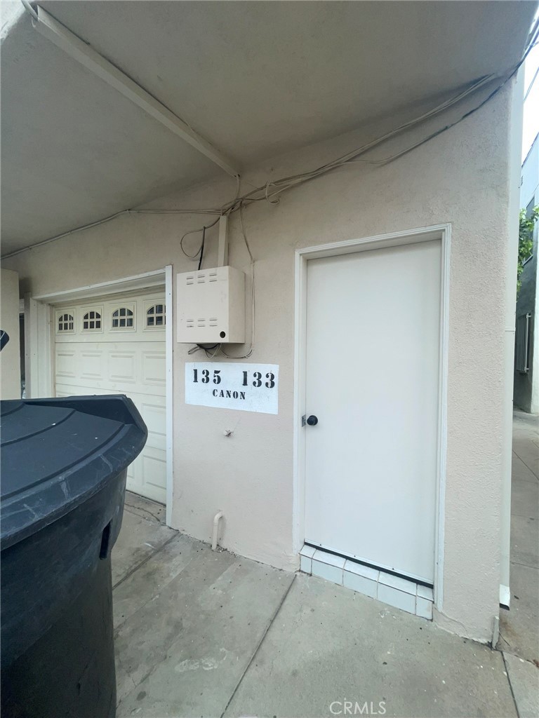 135 Canon Drive Beverly Hills, CA 90212 - Photo 42 of 42 a room with storage and utility