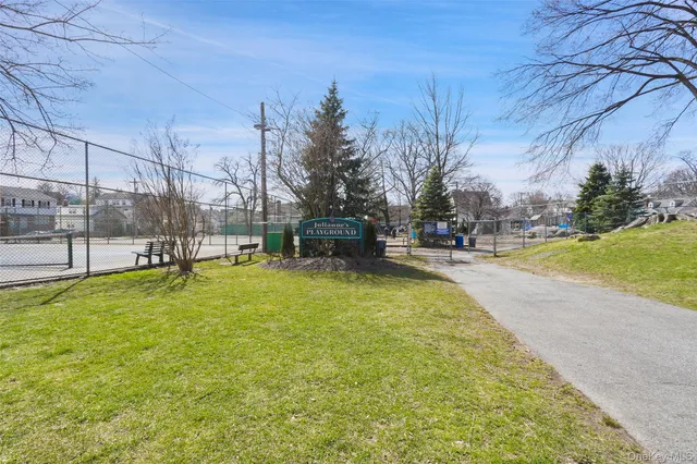 a view of yard with swimming pool