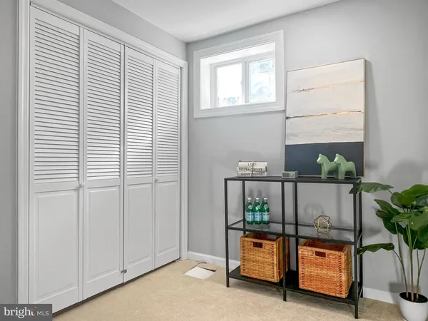 a hallway with sliding door and yard