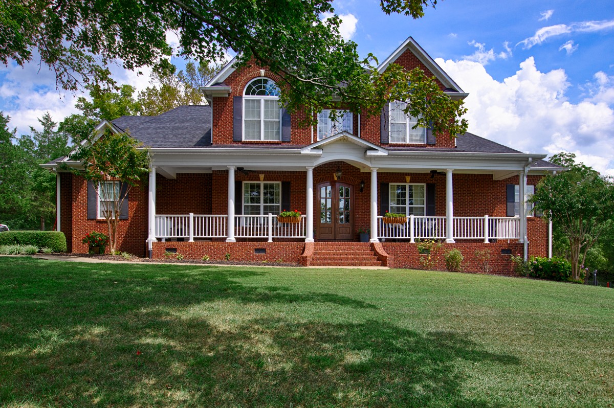 983 Veto Road Prospect, TN 38477 - Photo 1 of 43 front view of a house with a yard