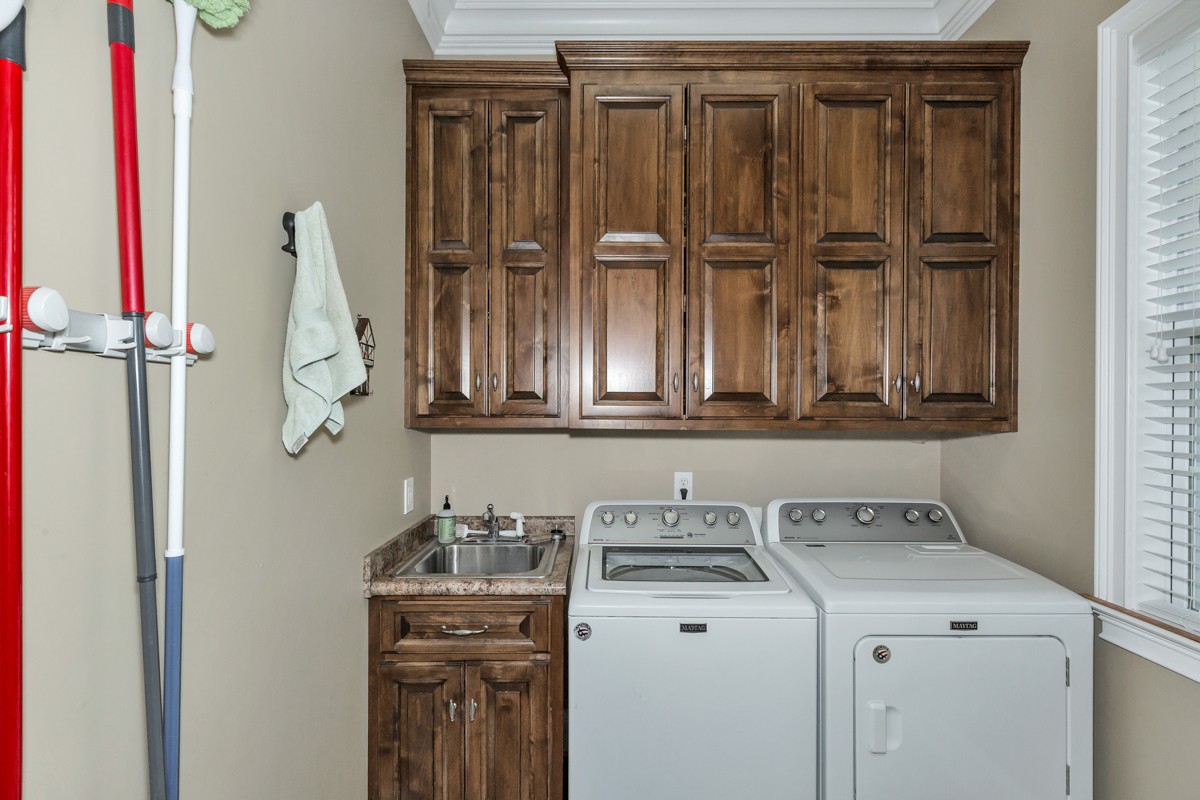 983 Veto Road Prospect, TN 38477 - Photo 14 of 43 a utility room with dryer and washer