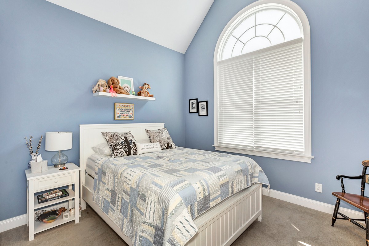 983 Veto Road Prospect, TN 38477 - Photo 19 of 43 a bedroom with a bed and a window