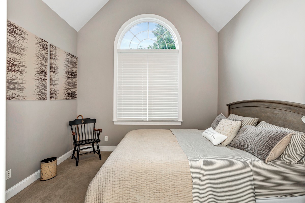 983 Veto Road Prospect, TN 38477 - Photo 22 of 43 a bedroom with a bed and a window