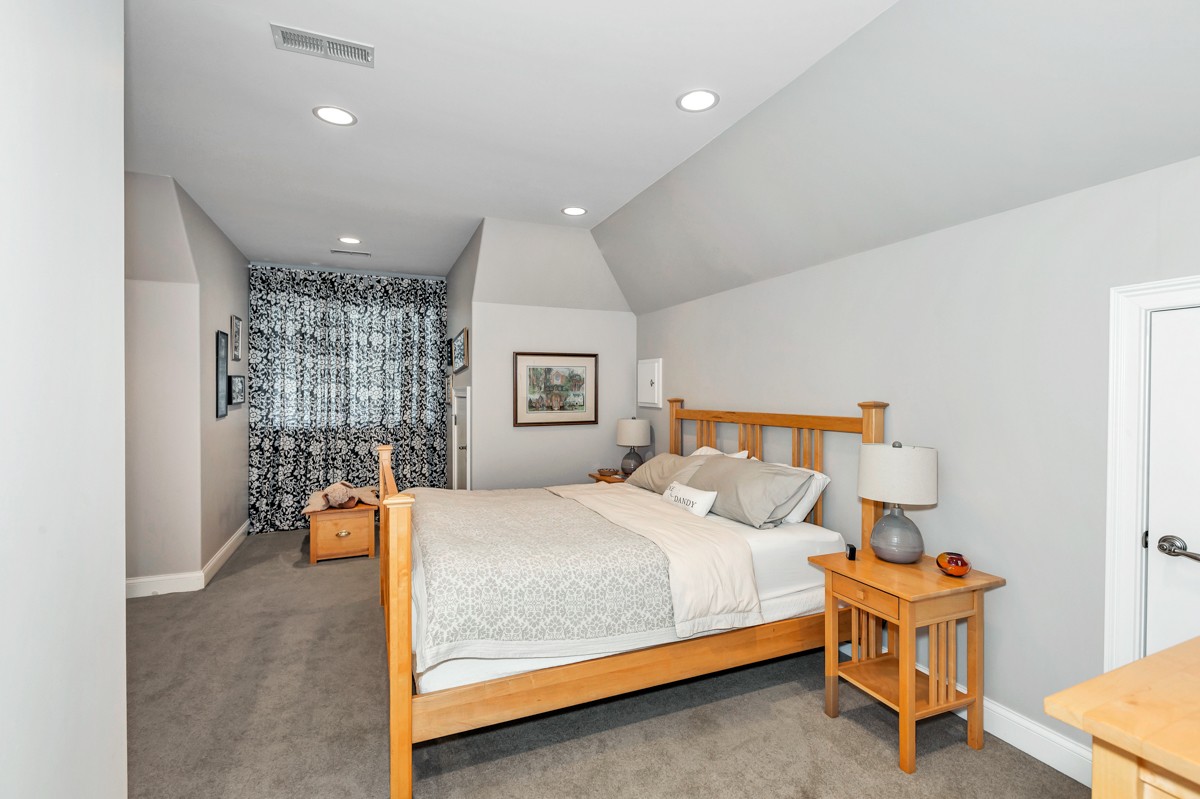 983 Veto Road Prospect, TN 38477 - Photo 23 of 43 a bedroom with a bed and lamp