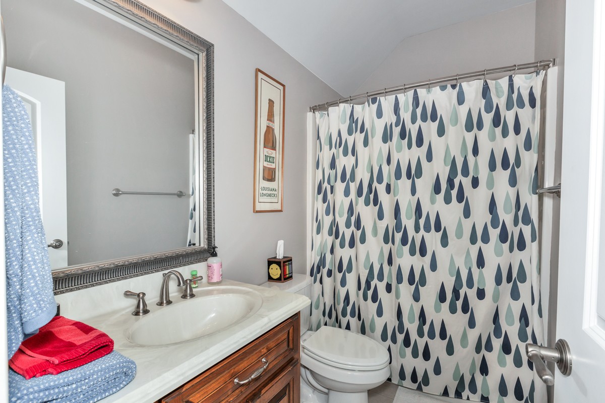 983 Veto Road Prospect, TN 38477 - Photo 25 of 43 a bathroom with a sink toilet and shower