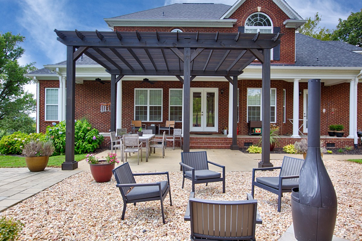983 Veto Road Prospect, TN 38477 - Photo 30 of 43 a view of a patio with plants and chairs