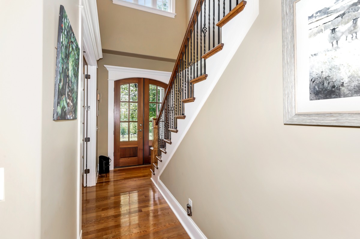 983 Veto Road Prospect, TN 38477 - Photo 4 of 43 a view of a hallway with wooden floor and staircase