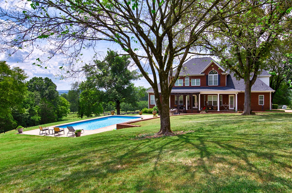 983 Veto Road Prospect, TN 38477 - Photo 35 of 43 a front view of a house with a yard