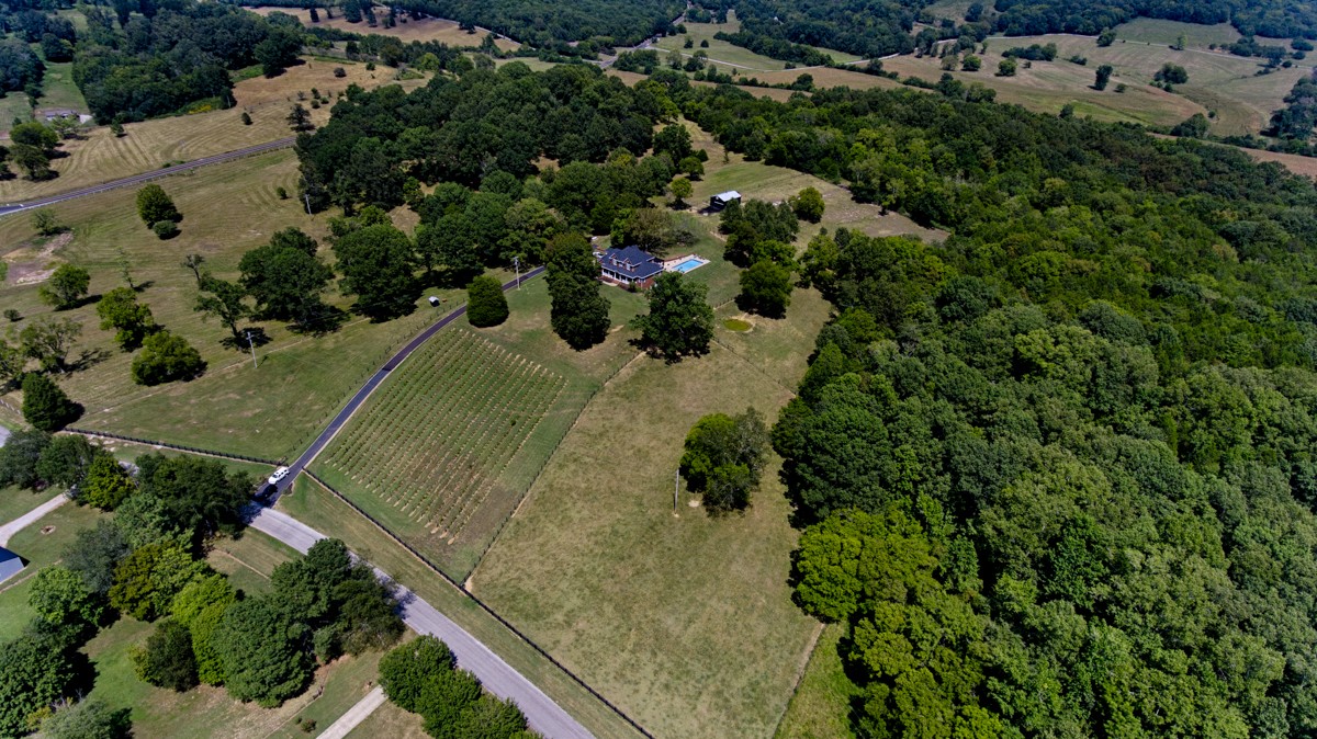 983 Veto Road Prospect, TN 38477 - Photo 41 of 43 an aerial view of a house with a yard