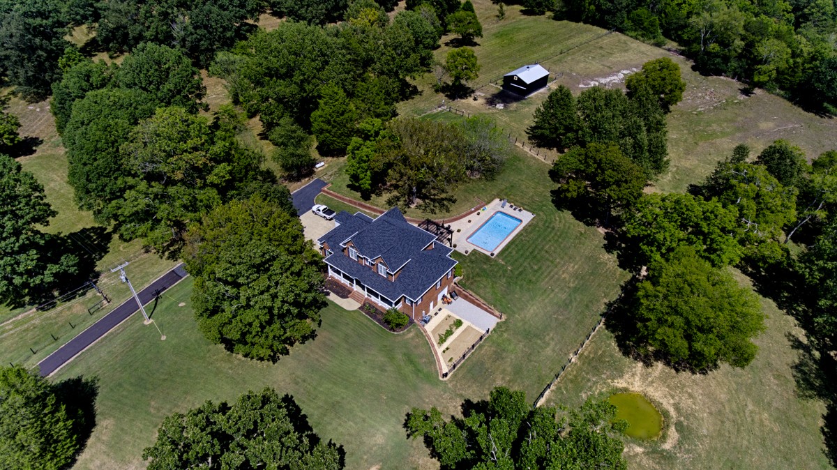983 Veto Road Prospect, TN 38477 - Photo 42 of 43 an aerial view of a house with a yard