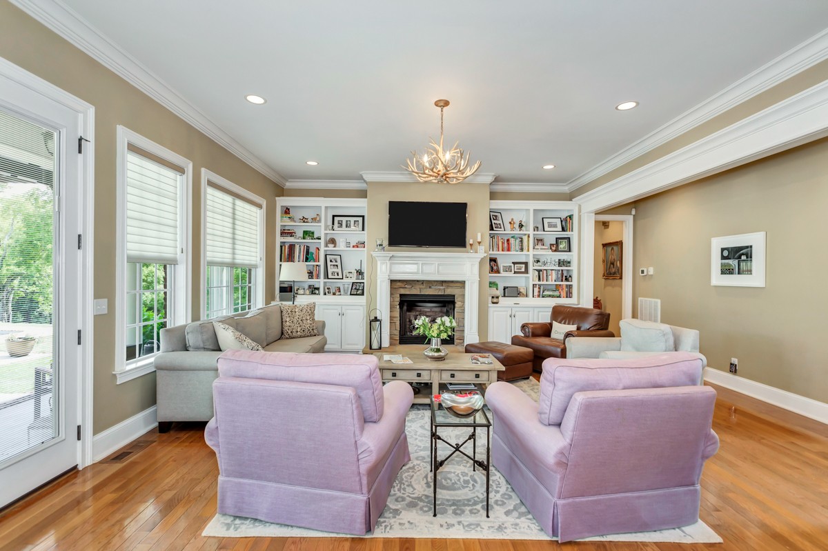 983 Veto Road Prospect, TN 38477 - Photo 7 of 43 a living room with furniture a large window and a fireplace