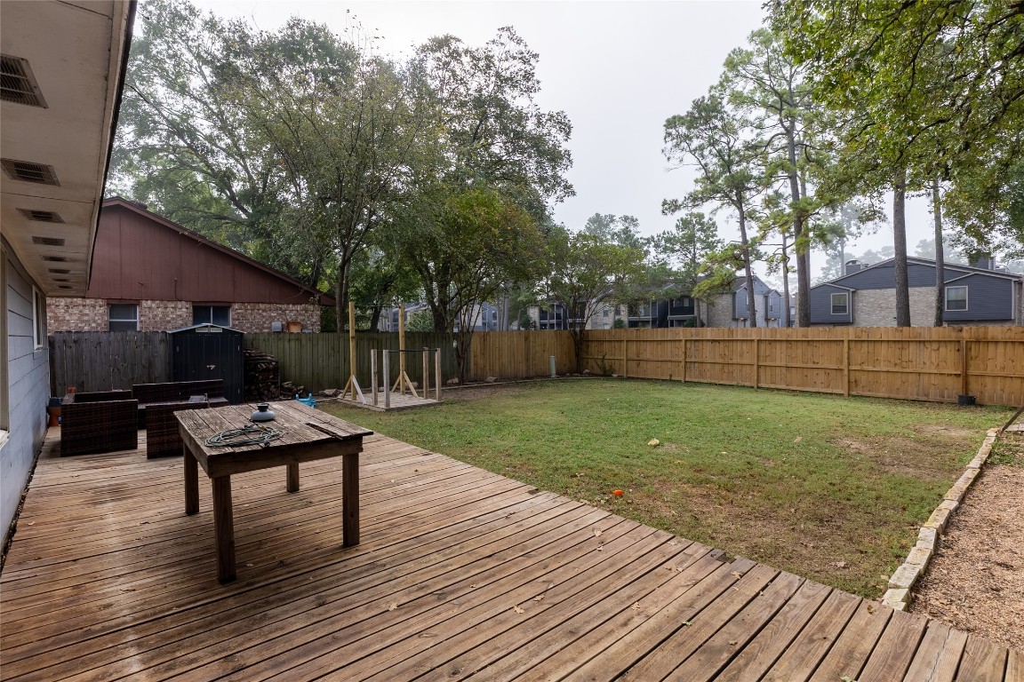 5818 Yorkgate Drive Spring, TX 77373 - Photo 17 of 19 Expansive fenced backyard with plenty of room for pets, play, or a future garden.