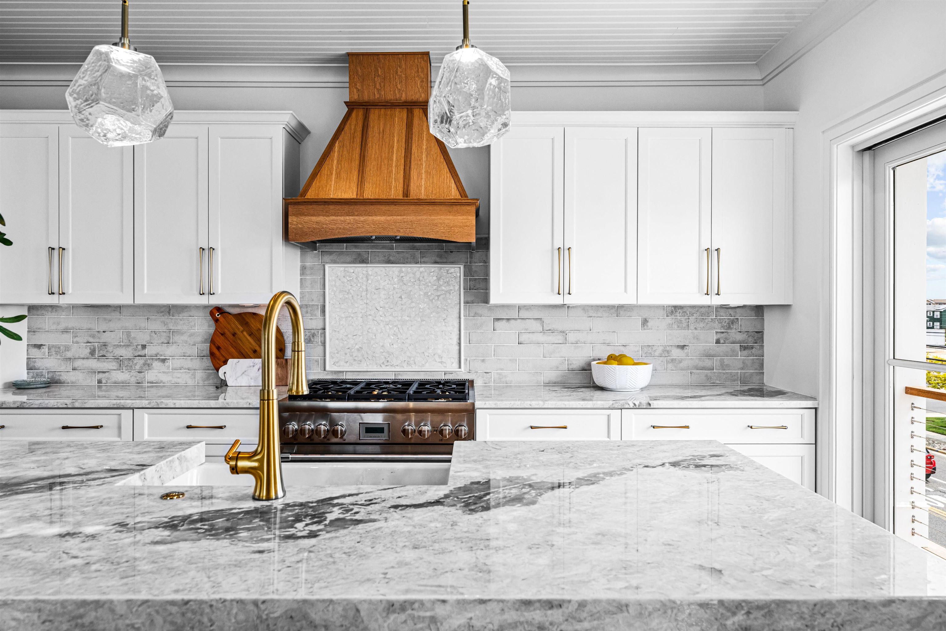 2158 Ocean Drive, Unit 2158 Avalon, NJ 08202 - Photo 24 of 50 a kitchen with stainless steel appliances granite countertop a stove a sink and a microwave