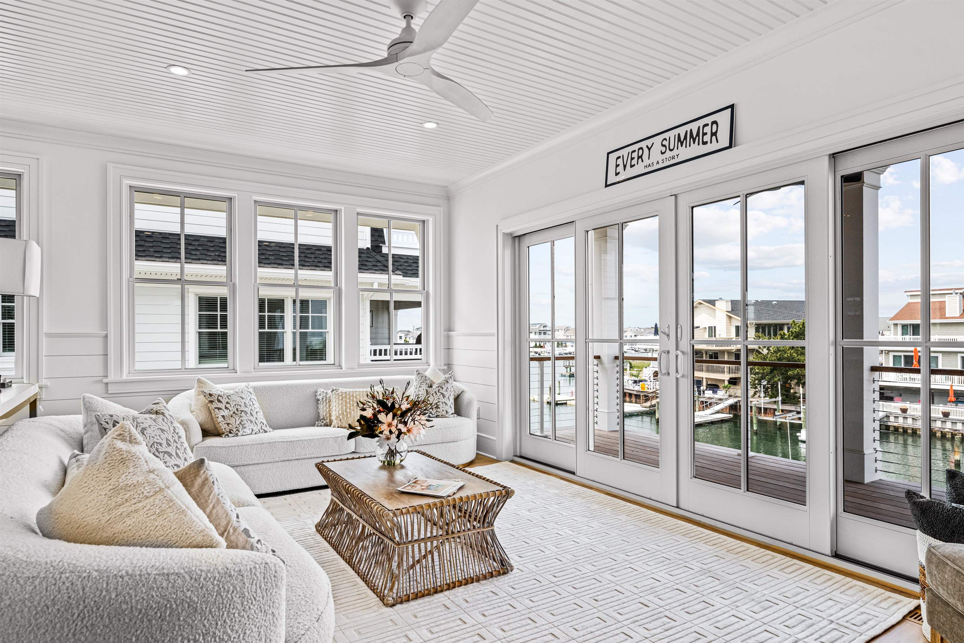 2158 Ocean Drive, Unit 2158 Avalon, NJ 08202 - Photo 29 of 50 a living room with furniture and large windows