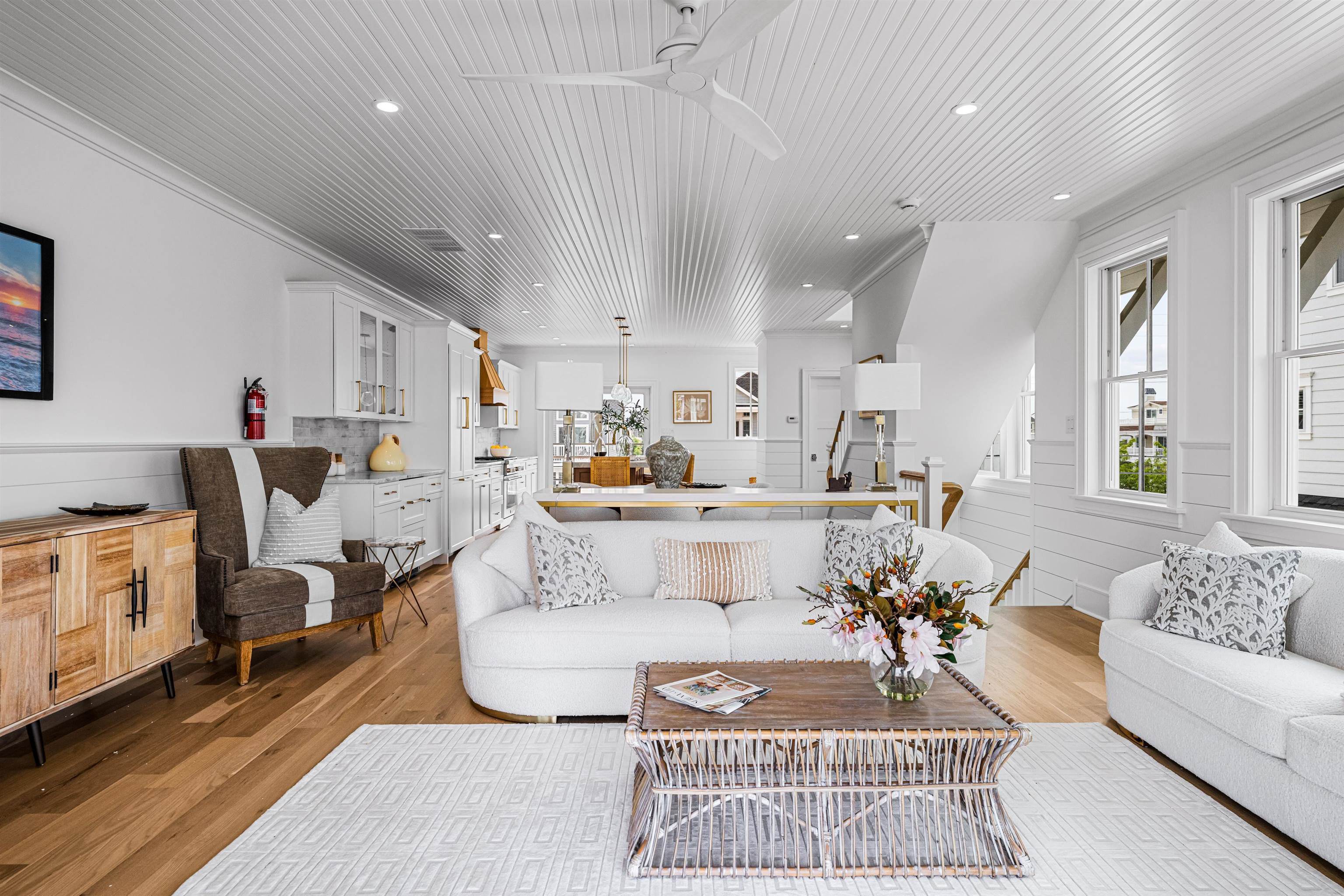 2158 Ocean Drive, Unit 2158 Avalon, NJ 08202 - Photo 31 of 50 a living room with furniture and a table